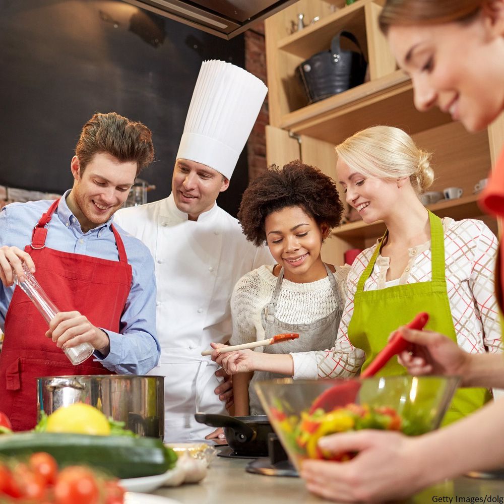 group of people preparing meal together