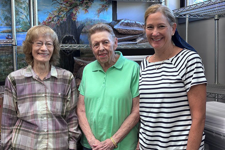 three women standing together